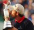 A triumphant Harrington kisses the Claret Jug
