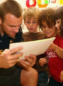 Chris Latham with some kids at RWC