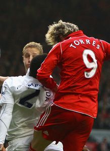 Torres saves sorry Reds 