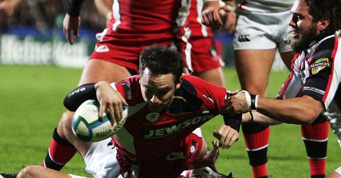Ryan Lamb dives over for one of Gloucester's five tries against Ulster