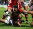 Ryan Lamb dives over for one of Gloucester's five tries against Ulster