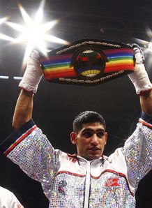 Classy Khan keeps belt