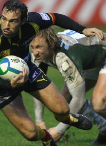 Cedric Rosalen and Peter Richards battle fopr the ball in Heineken Cup action Cedric Rosalen and Peter Richards battle fopr the ball in Heineken Cup action