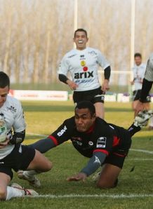 Kaine Robertson scores against Saracens in the Heineken Cup Kaine Robertson scores against Saracens in the Heineken Cup