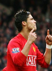 Ronaldo double sees Reds through