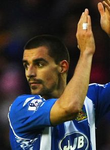 Latics prepare Scharner deal