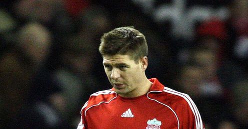 Gerrard: trudges off after 1-1 draw with Wigan at Anfield