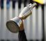 Claret Jug: who is holding it?