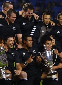 All black with triNations trophy