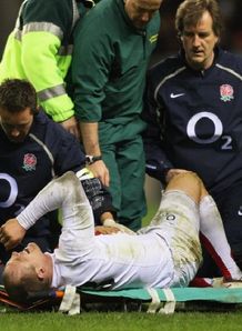 Mike Tindall is down and out against England