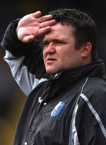 Holland departs Mansfield