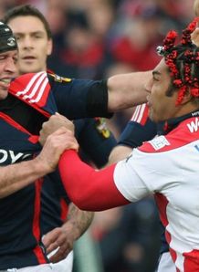 The Munster and Gloucester players have a little chat The Munster and Gloucester players have a little chat