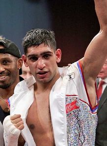 Powell in Khan's corner