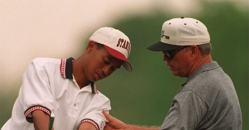 Helping hand: Harmon coaching a young Tiger Woods, at the 1995 Masters