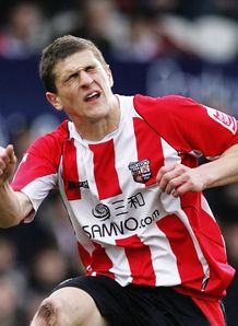 Wycombe land Mousinho