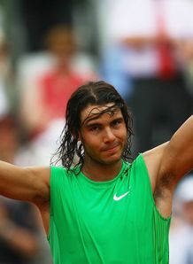 Classy Nadal stays on track
