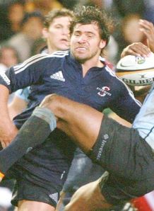 Tuqiri tackled by a Stormer Tuqiri tackled by a Stormer