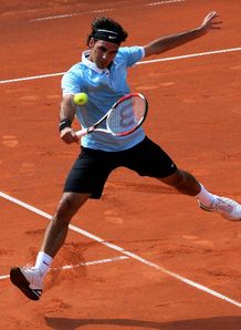 Fed, Nadal safely through