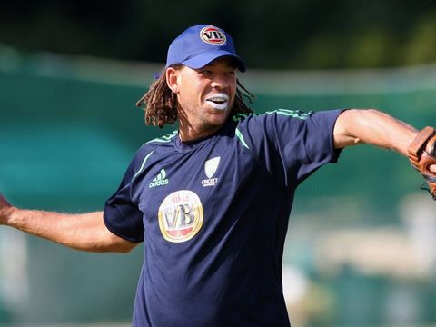 Andrew Symonds gets to some fielding practice.