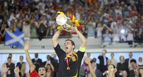 Iker Casillas lifts the trophy - and Spain are kings of Europe.