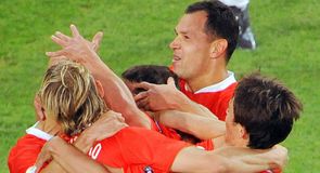 Russia celebrate the only goal of the game.