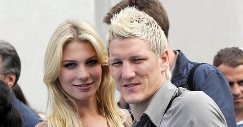 Bastian Schweinsteiger and Sarah Brandner arrive at training for Euro 2008