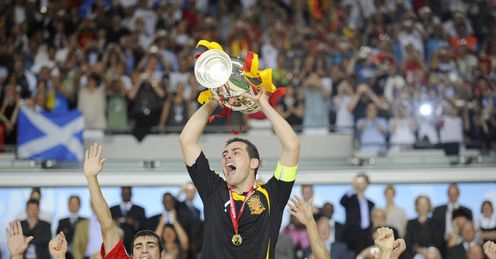 Iker Casillas lifts the trophy - and Spain are kings of Europe.
