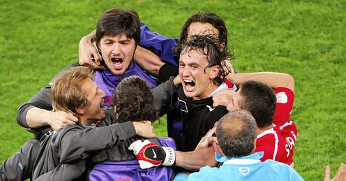 Turkey celebrate a dramatic late victory.