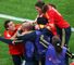 Spain celebrate David Villa's dramatic late winner.