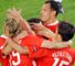 Russia celebrate the only goal of the game.