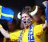 A Swedish fan shows his true colours before the big kick-off