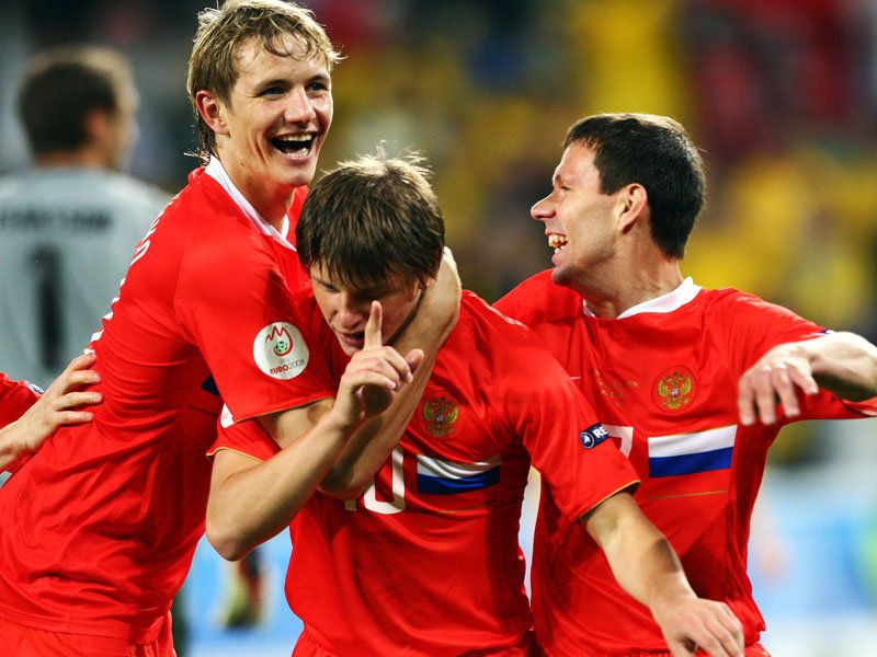 Russia's players celebrate in joy and excitment as the team leads during a World Cup qualifier