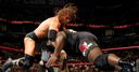 WWE Champion Triple H Pedigrees Mark Henry to earn Raw the first draft pick.
