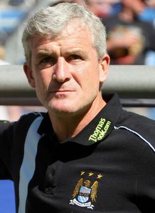 Hughes set for City stay