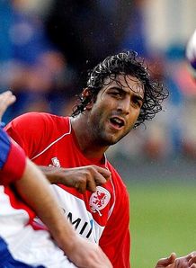 Mido claims Wigan interest