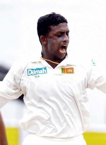 Murali, Mendis rip India apart