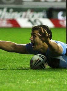 Jon Wilkin St Helens scoring against Wigan at the JJB Stadium