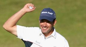 The final putt is in. Padraig's the champion again