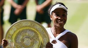 Venus Williams won the women's singles for the fifth time, beating sister Serena 7-5 6-4.