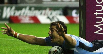 Jon Wilkin St Helens scoring against Wigan at the JJB Stadium