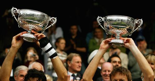 Zimonjic and Nestor with their trophies Zimonjic and Nestor with their trophies