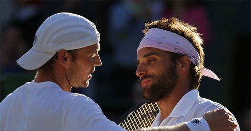 Schuettler and Clement: after their marathon match Schuettler and Clement: after their marathon match