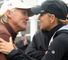 Greg Norman gets a kiss from wife Chris Evert.