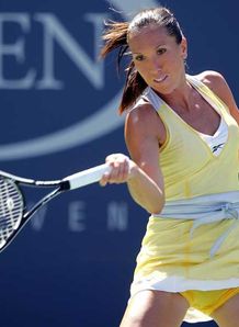 Jankovic battles into last eight