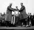 Sponsor of the tournament Samuel Ryder presents the trophy to the British captain in Leeds.