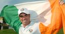 A joyous McGinley flies the flag
