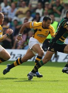Carlos Spencer on the charge for Northampton against Wasps Carlos Spencer on the charge for Northampton against Wasps