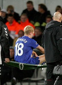 Paul Scholes stretchered off