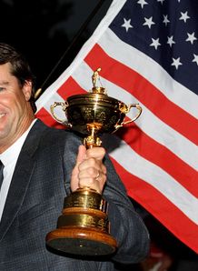Victorious US captain Paul Azinger poses with Ryder Cup trophy