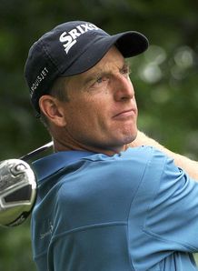 Furyk storms into BMW share
